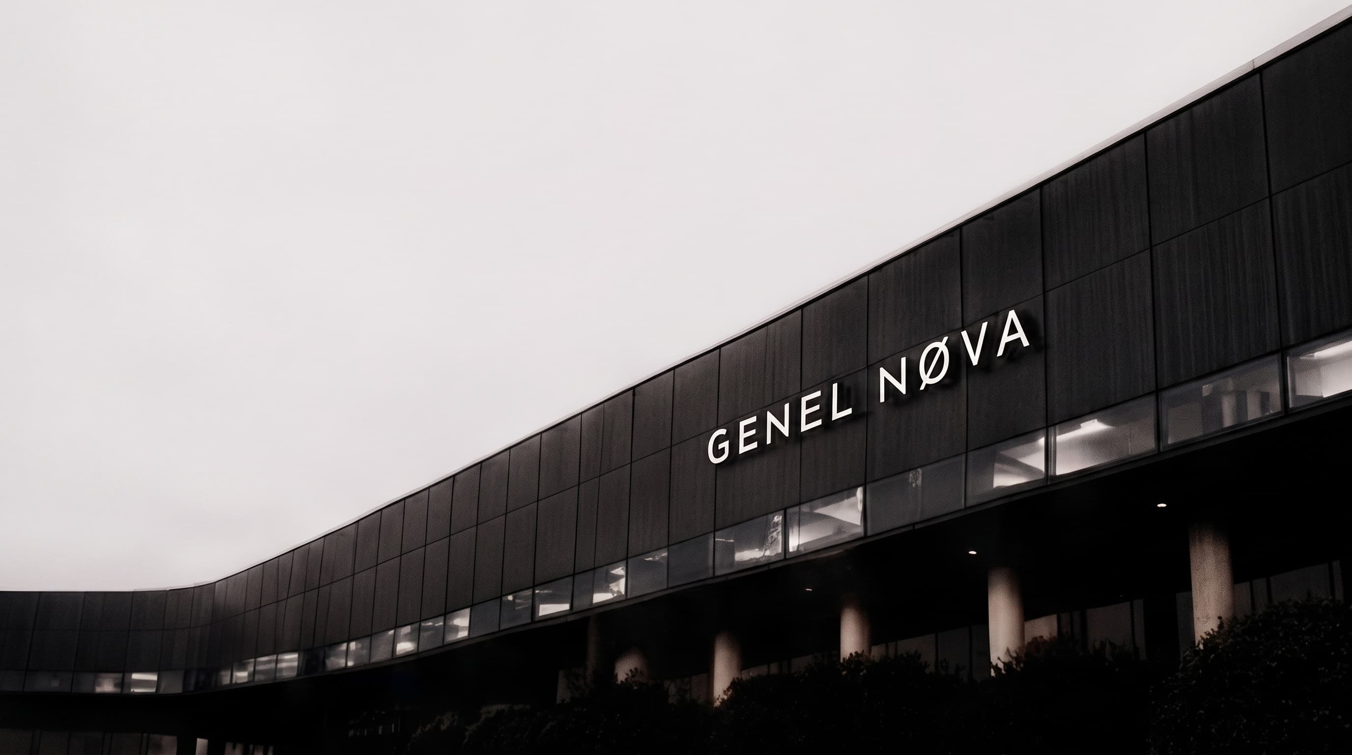 The Genel Nøva building at dusk, seen from below